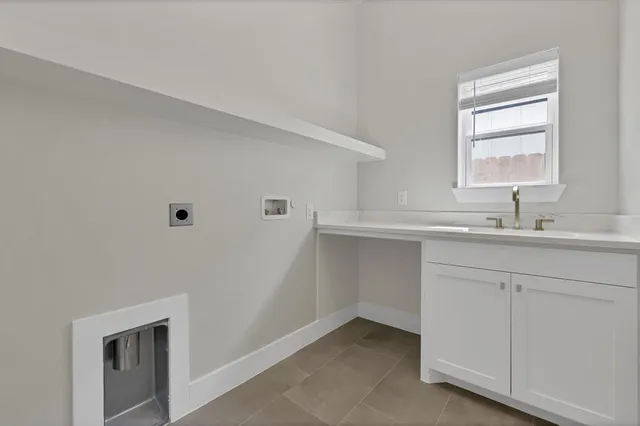 a bathroom with a sink vanity and mirror
