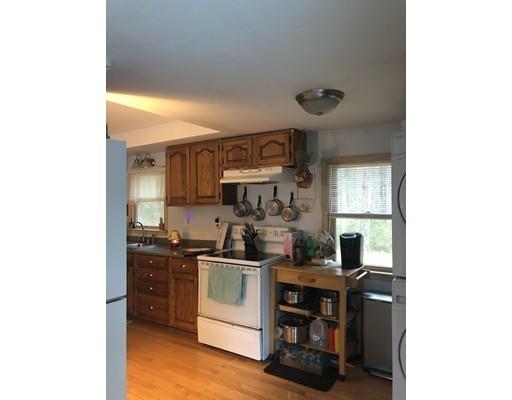 20 Crooked River Road Wareham, MA 02571 - Photo 10 of 14 a kitchen with a sink cabinets and window