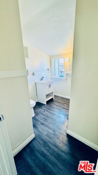 219 East 10th Street Long Beach, CA 90813 - Photo 13 of 26 a view of a room with wooden floor