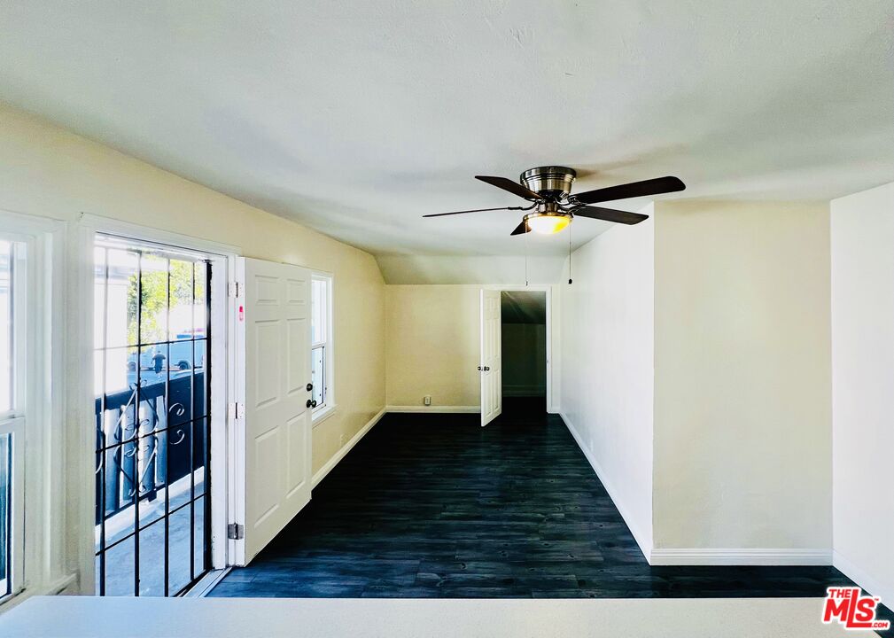 219 East 10th Street Long Beach, CA 90813 - Photo 4 of 26 a view of a hallway with wooden floor and entryway
