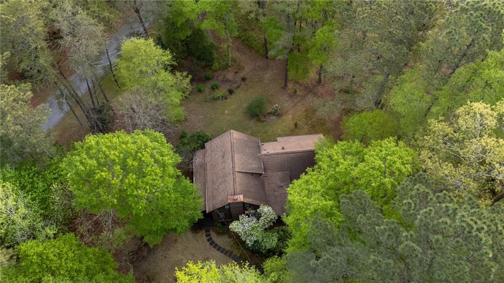 3121 Bonds Lake Road Northwest Conyers, GA 30012 - Photo 34 of 36 an aerial view of a house with a yard