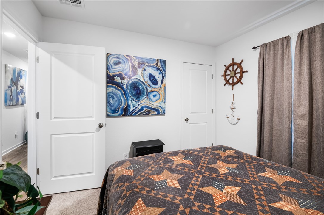 3623 East Andrea Drive Kingman, AZ 86409 - Photo 19 of 40 This room features white walls, two paneled doors, and carpeted flooring