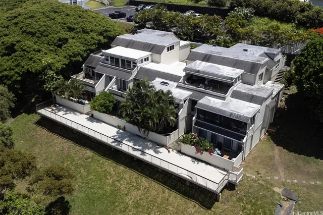 an aerial view of house with yard
