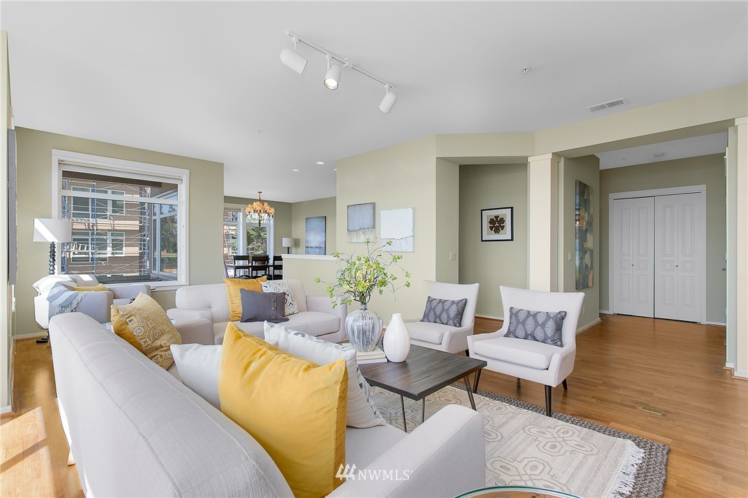 1950 Alaskan Way, Unit 237 Seattle, WA 98101 - Photo 4 of 20 a living room with furniture and a table