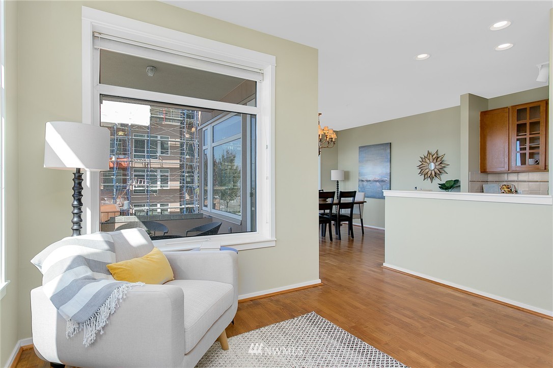 1950 Alaskan Way, Unit 237 Seattle, WA 98101 - Photo 5 of 20 a living room with furniture and a table