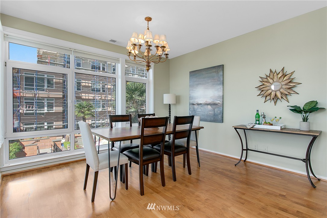 1950 Alaskan Way, Unit 237 Seattle, WA 98101 - Photo 8 of 20 a view of a dining room with furniture window and outside view