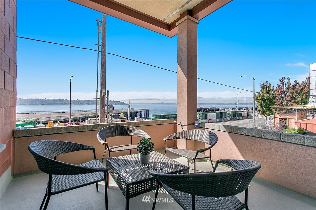 1950 Alaskan Way, Unit 237 Seattle, WA 98101 - Photo 10 of 20 a view of a swimming pool with chairs