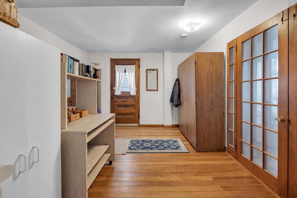 228 Walnut Hill Road Orange, MA 01364 - Photo 12 of 20 a view of a kitchen with refrigerator and wooden floor