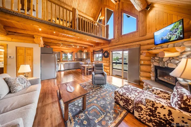 a view of a chairs and a table in the patio