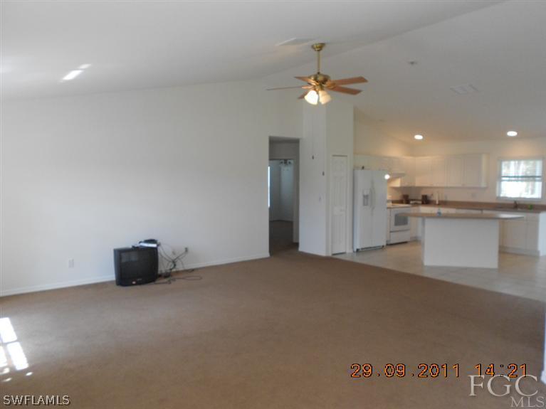 217 Rue Labonne Road Fort Myers, FL 33913 - Photo 2 of 8 a view of an empty room with a window