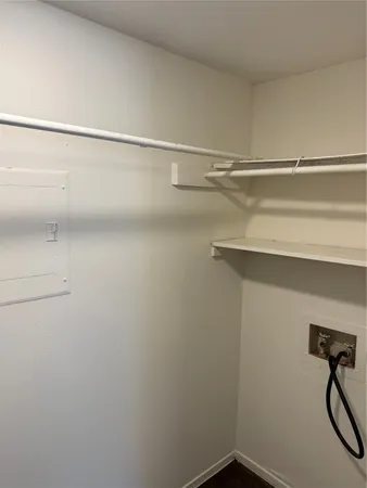 a view of a room with racks on the wall