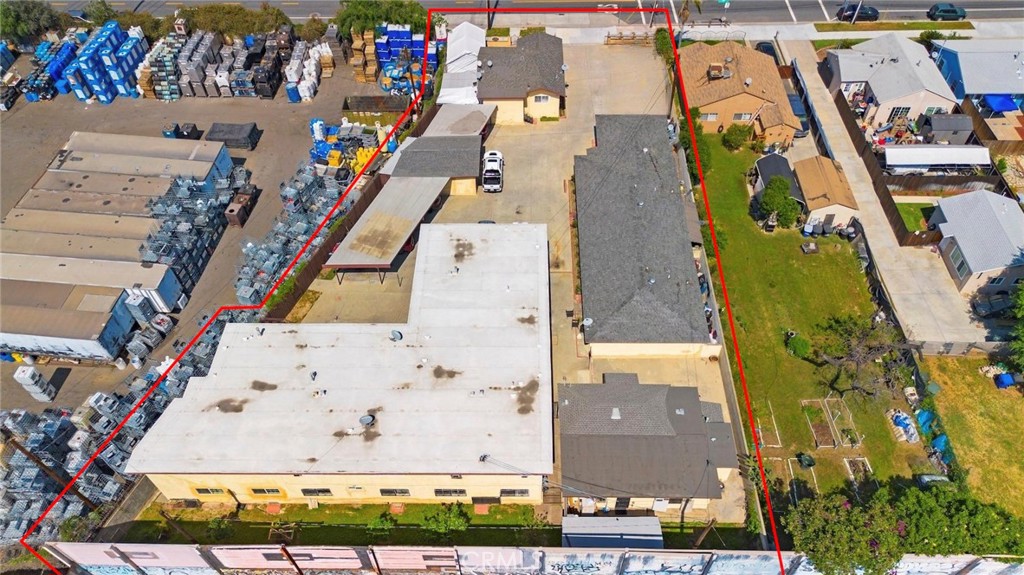 6260 Ferguson Drive Commerce, CA 90022 - Photo 21 of 28 an aerial view of residential houses with outdoor space