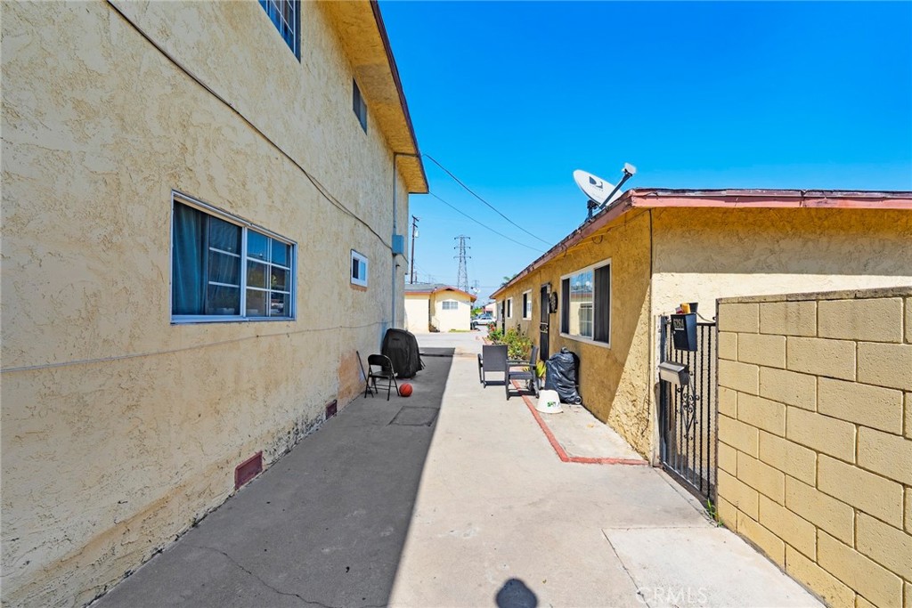 6260 Ferguson Drive Commerce, CA 90022 - Photo 4 of 28 a front view of a house with outdoor seating