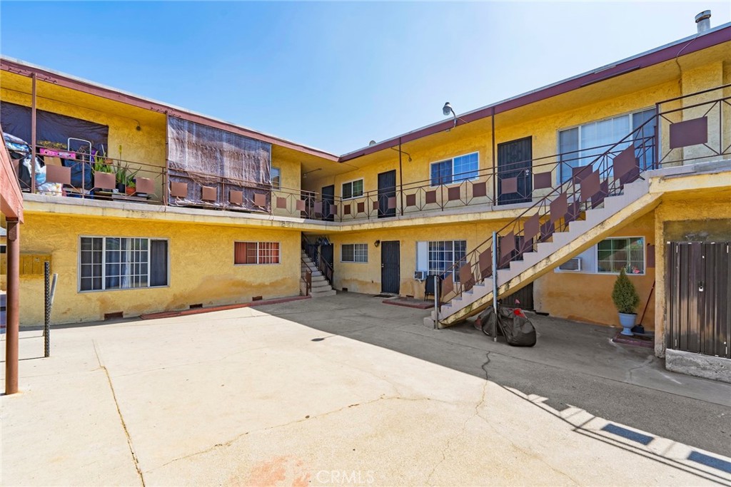 6260 Ferguson Drive Commerce, CA 90022 - Photo 5 of 28 a front view of a building with a swimming pool