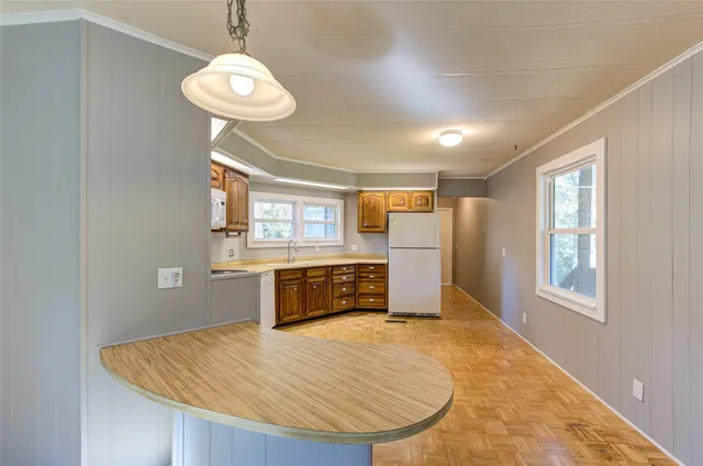 a bedroom with a bed and dresser