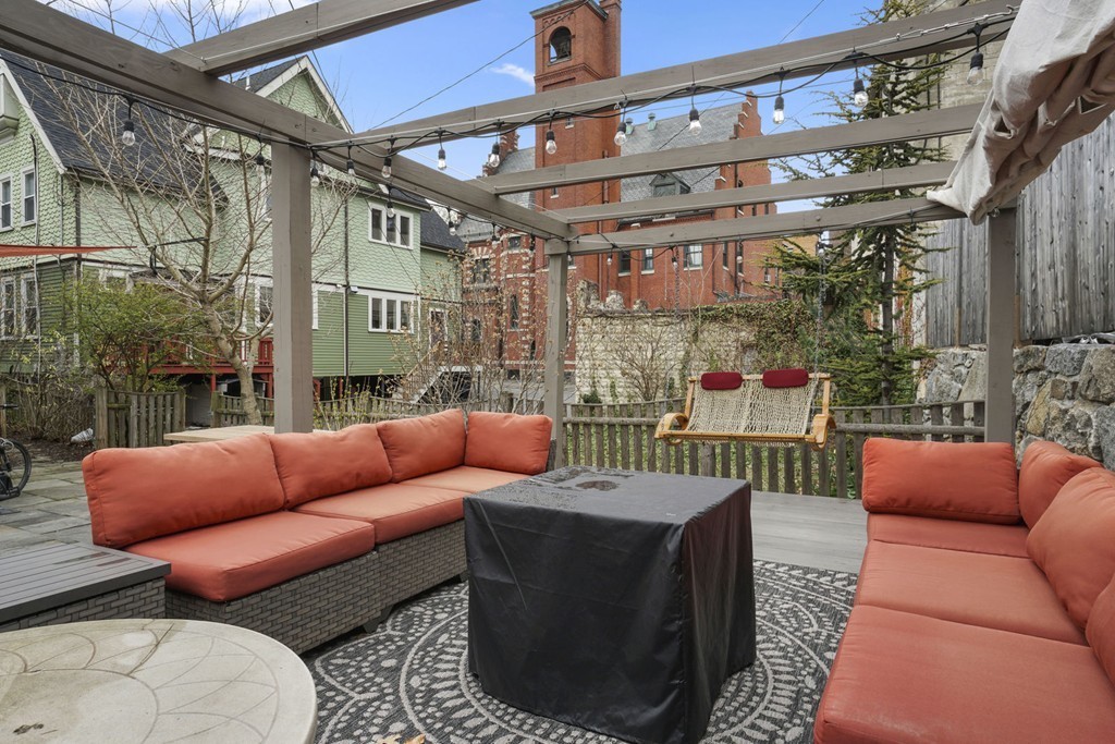 655 Washington Street, Unit 655 Brookline, MA 02446 - Photo 24 of 26 a outdoor living space with patio furniture and a potted plant