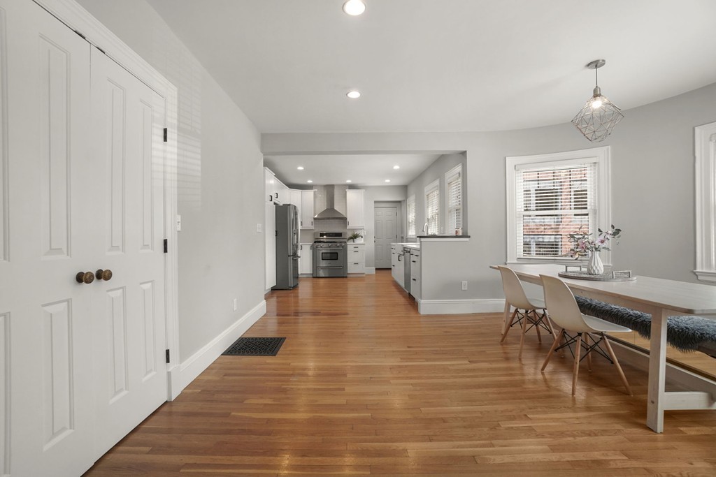 655 Washington Street, Unit 655 Brookline, MA 02446 - Photo 6 of 26 a view of a dining room with furniture
