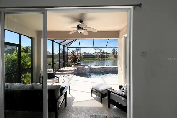 a view of pool with a patio