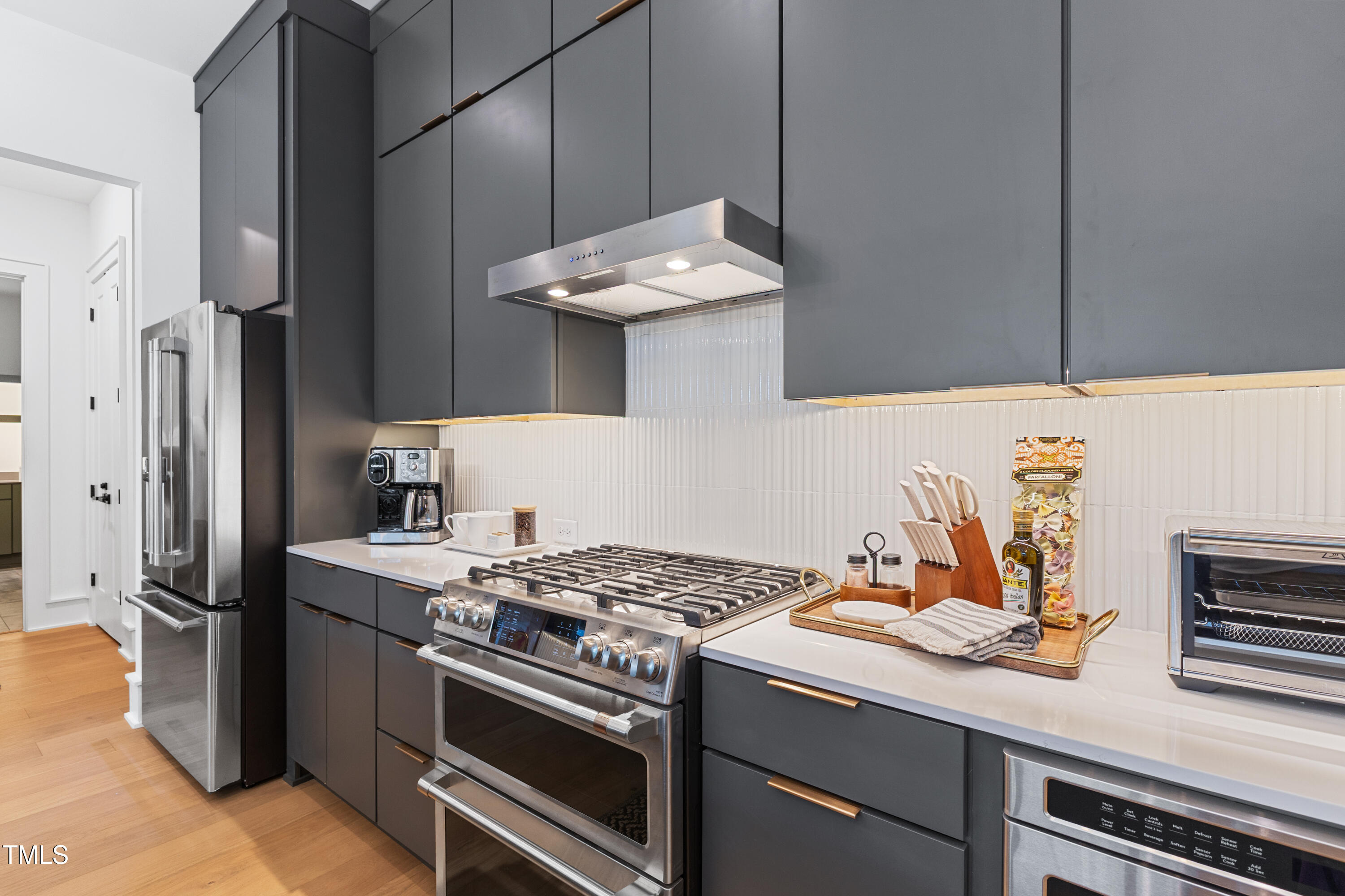 1625 Bruce Circle Raleigh, NC 27603 - Photo 22 of 63 a kitchen with a stove and a refrigerator