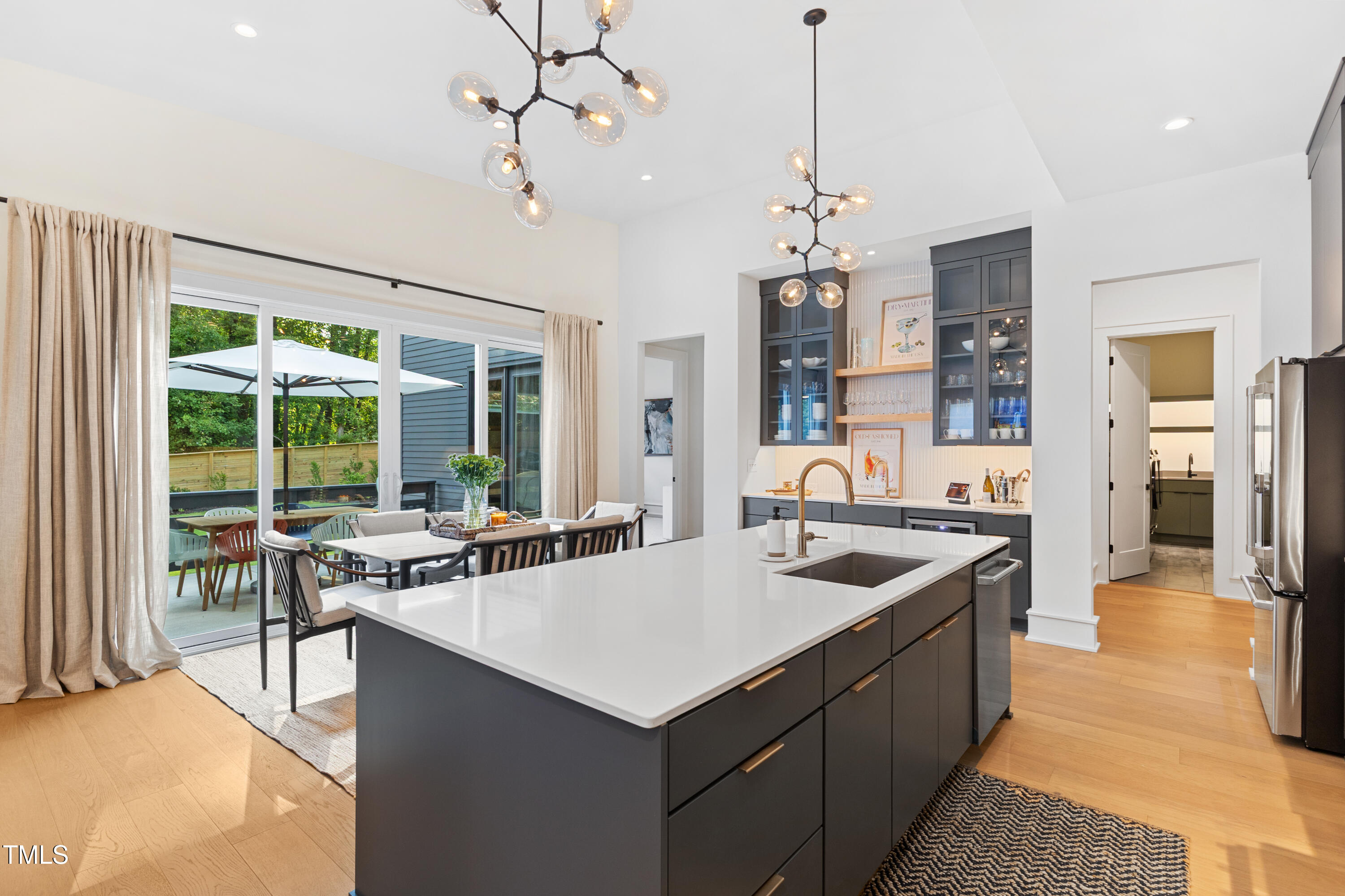 1625 Bruce Circle Raleigh, NC 27603 - Photo 23 of 63 a open kitchen with stainless steel appliances granite countertop a sink and a refrigerator