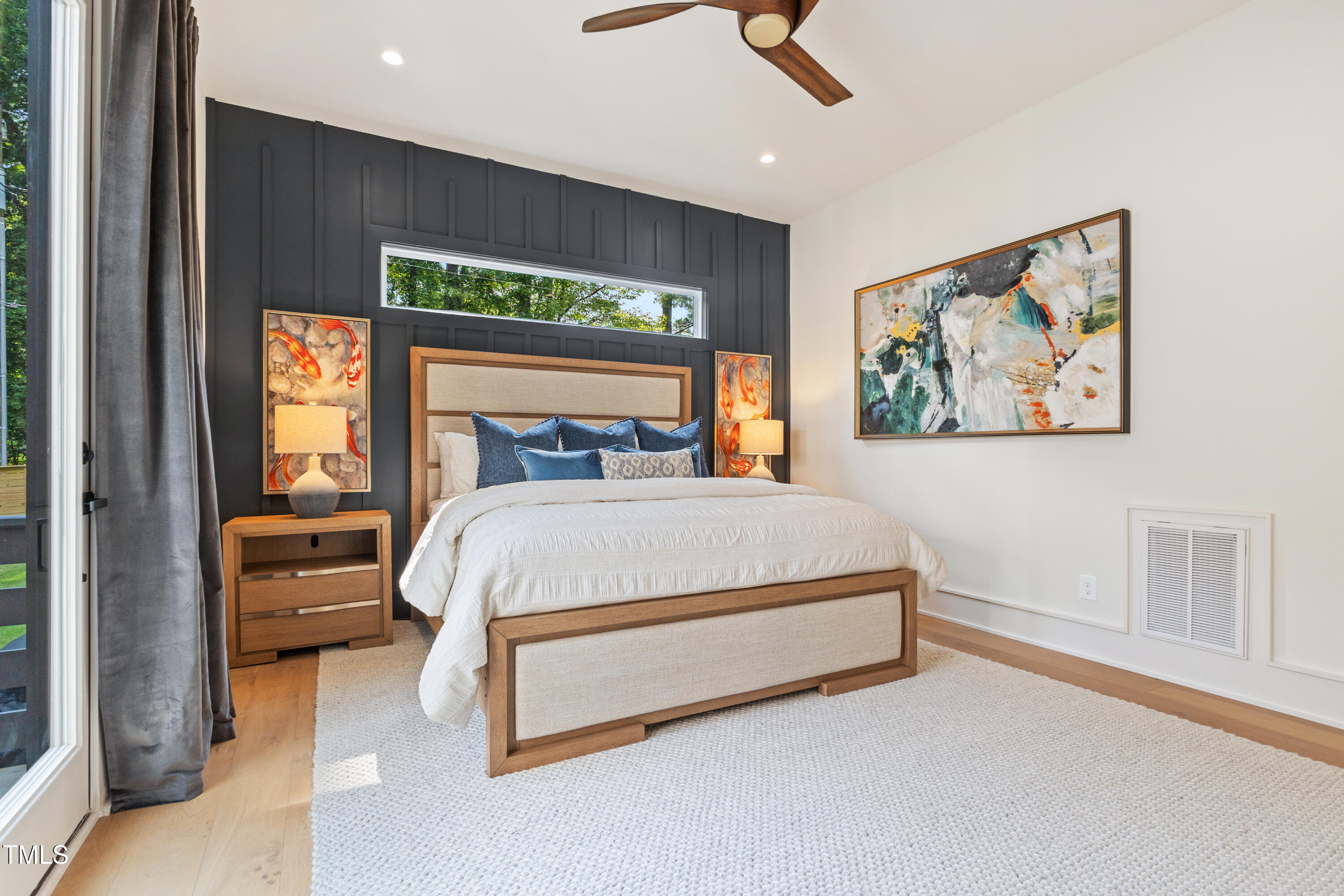 1625 Bruce Circle Raleigh, NC 27603 - Photo 29 of 63 a bed sitting in a bedroom next to a window