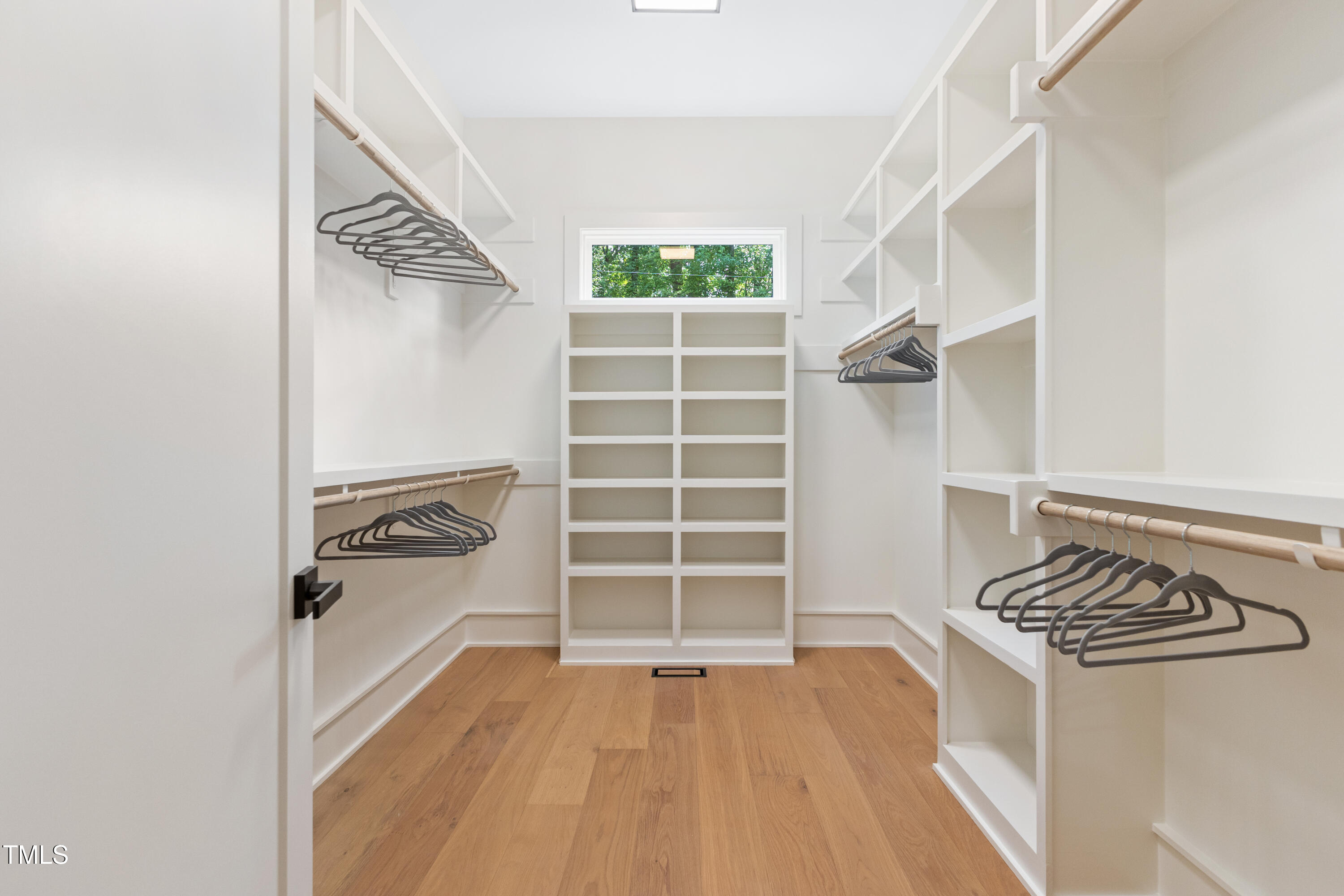 1625 Bruce Circle Raleigh, NC 27603 - Photo 40 of 63 a view of walk in closet with empty racks