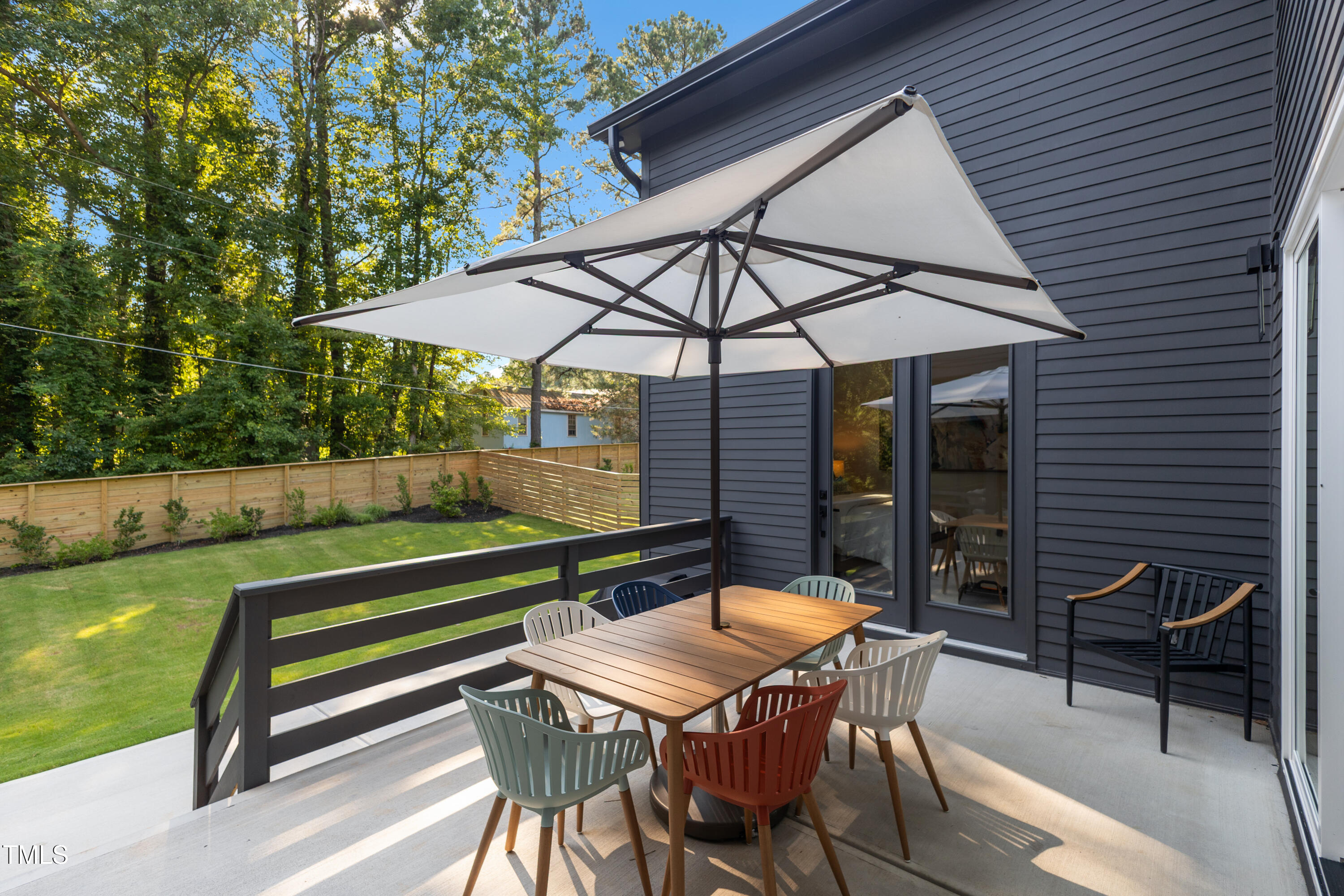 1625 Bruce Circle Raleigh, NC 27603 - Photo 50 of 63 a view of a chairs and table in the patio