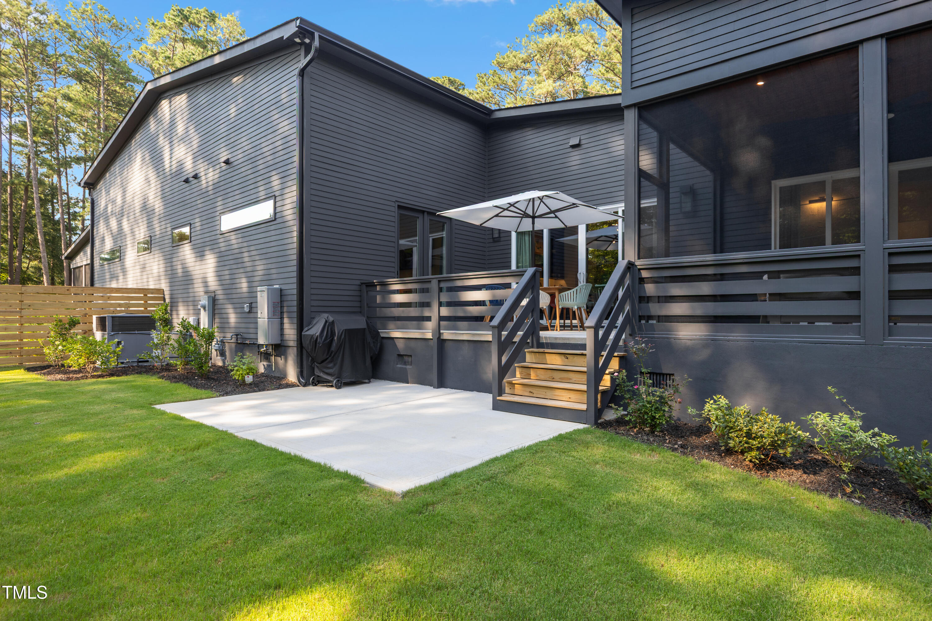 1625 Bruce Circle Raleigh, NC 27603 - Photo 53 of 63 a view of a house with backyard and sitting area