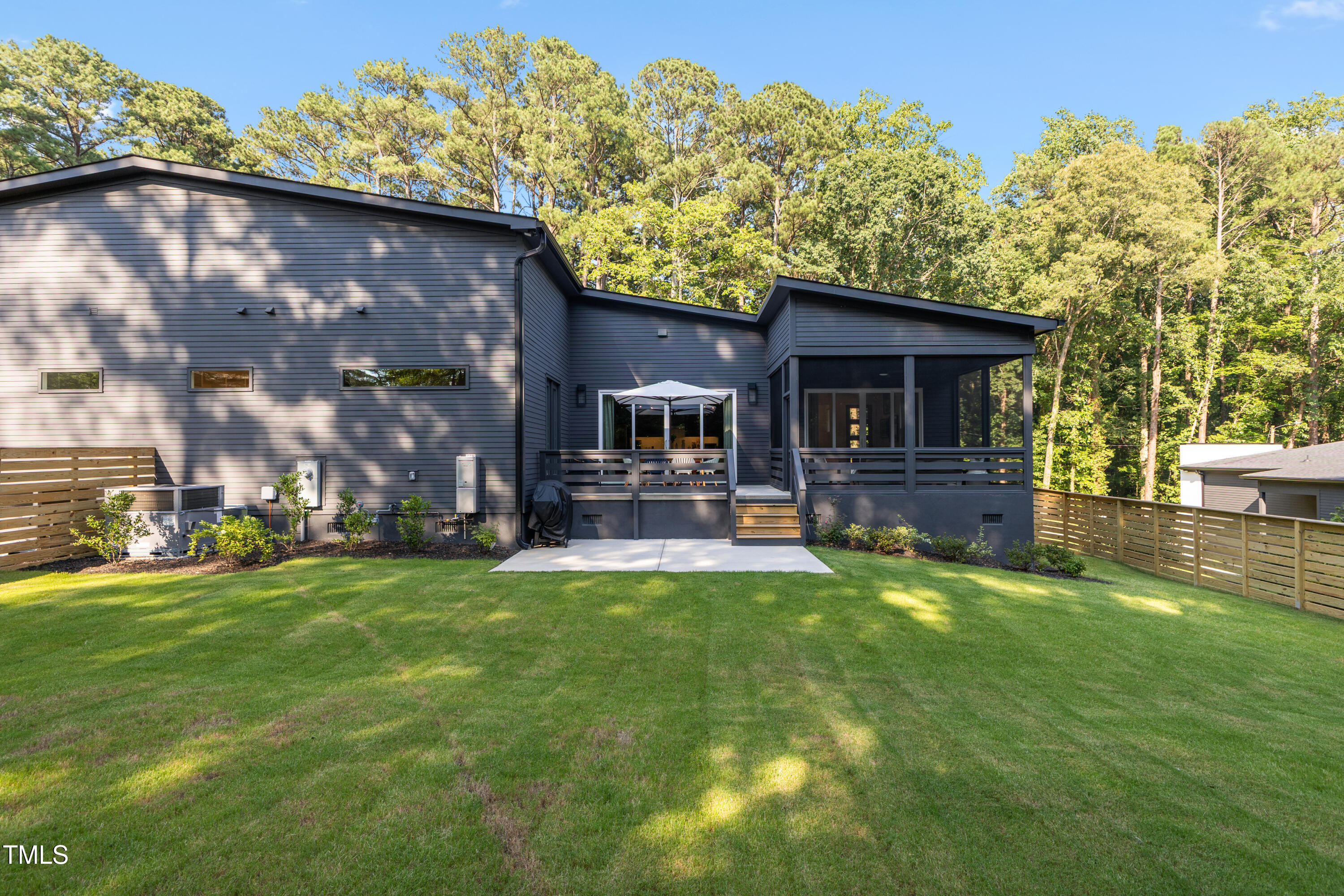 1625 Bruce Circle Raleigh, NC 27603 - Photo 57 of 63 a view of a house with backyard porch and sitting area