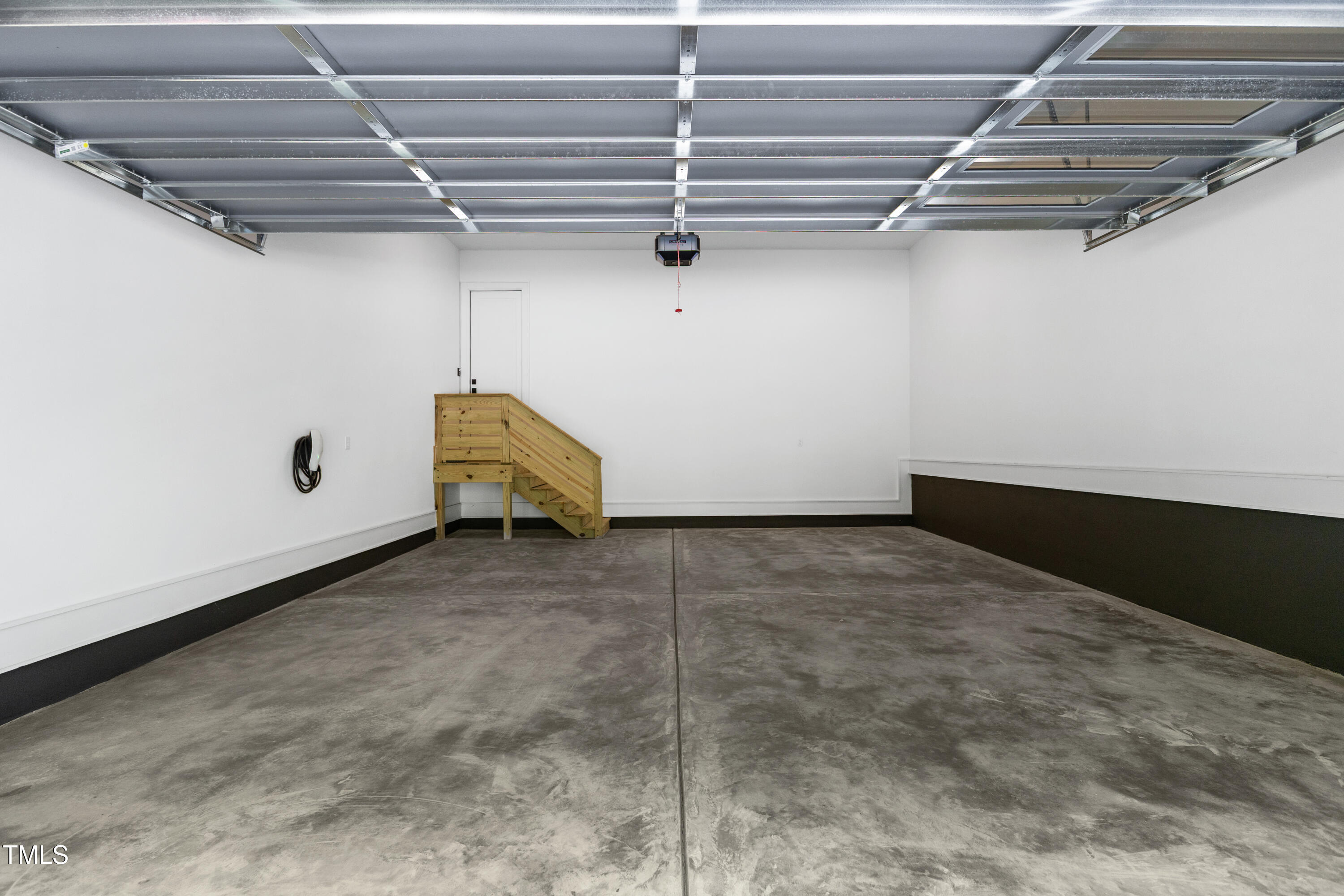 1625 Bruce Circle Raleigh, NC 27603 - Photo 61 of 63 a view of a room with racks on the wall