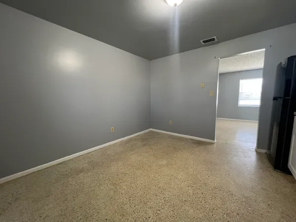 an empty room with a window