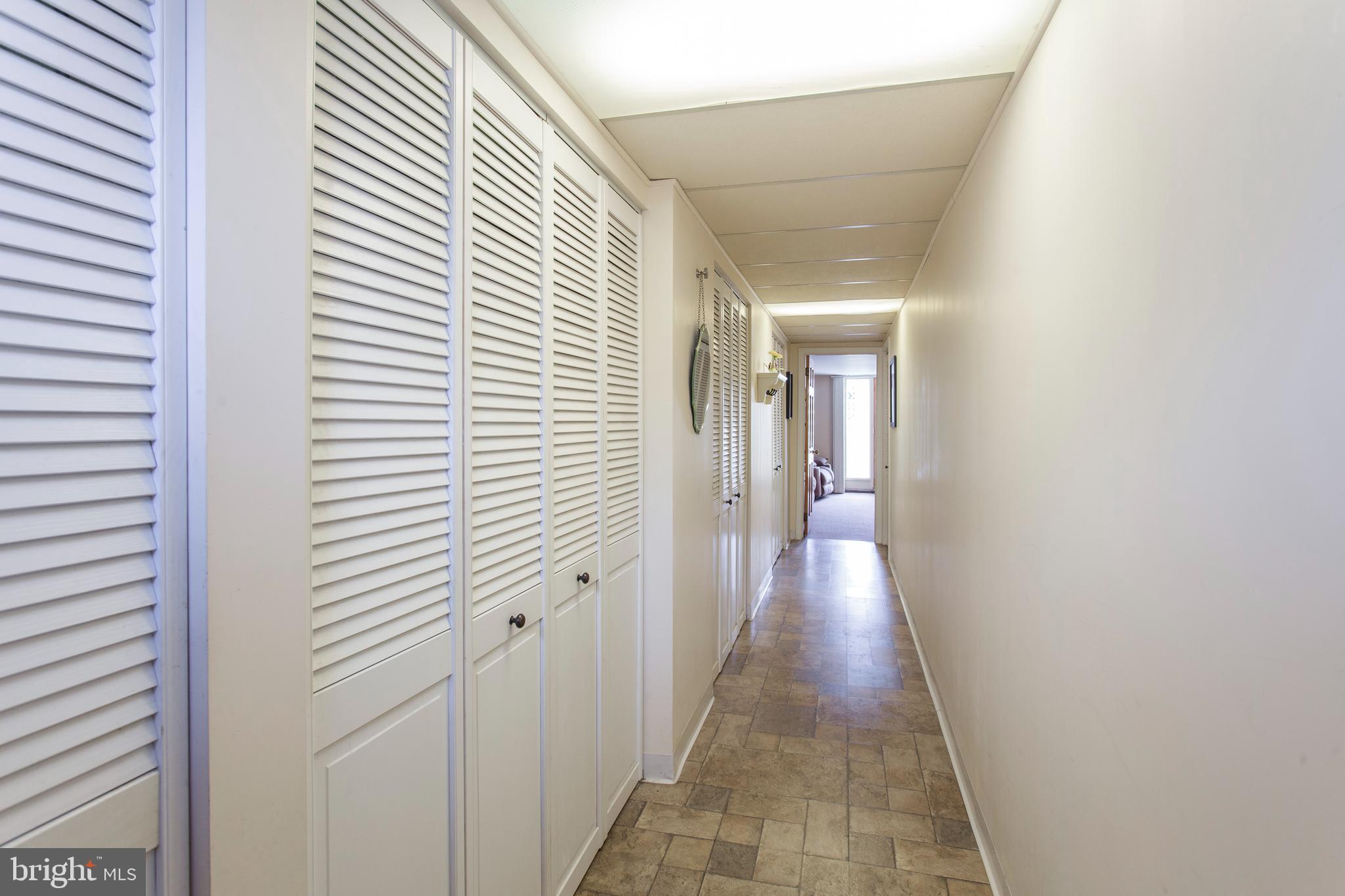 1142 Surrey Road Philadelphia, PA 19115 - Photo 18 of 21 Basement Hallway With Access To Driveway