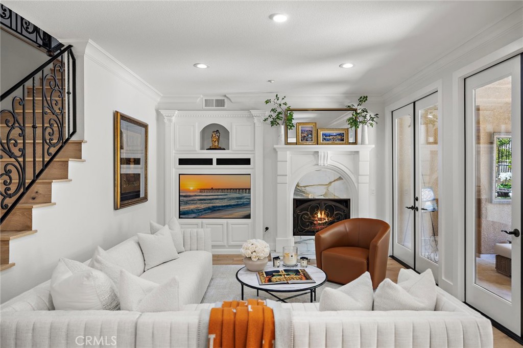 28 Tuscany Ladera Ranch, CA 92694 - Photo 12 of 47 a living room with furniture and a fireplace