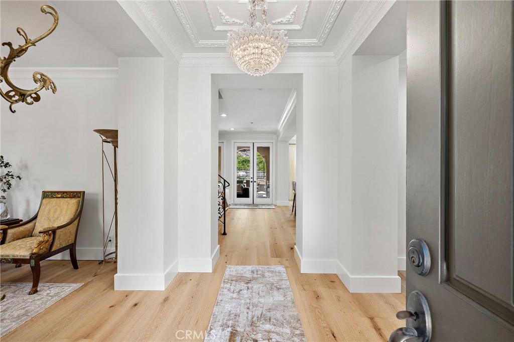 28 Tuscany Ladera Ranch, CA 92694 - Photo 18 of 47 a view of a hallway view with wooden floor and staircase