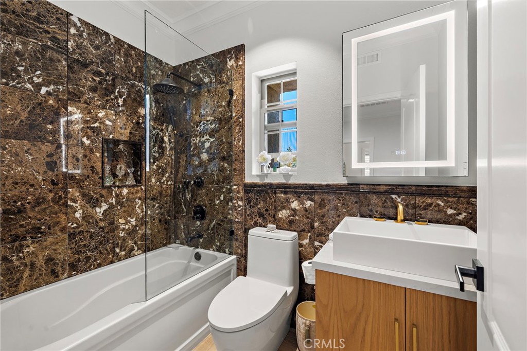 28 Tuscany Ladera Ranch, CA 92694 - Photo 32 of 47 a bathroom with a toilet sink and bathtub