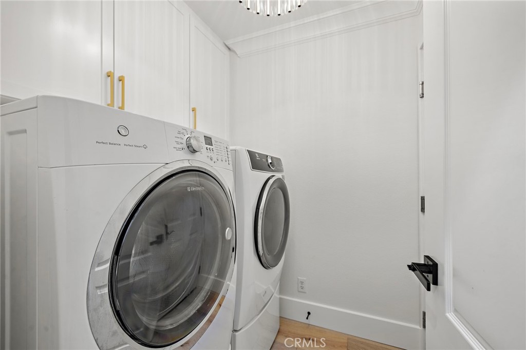 28 Tuscany Ladera Ranch, CA 92694 - Photo 34 of 47 a utility room with dryer and washer