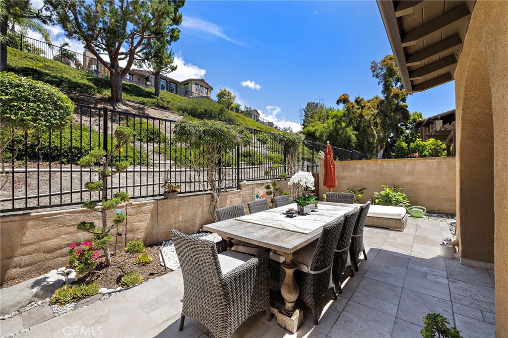 28 Tuscany Ladera Ranch, CA 92694 - Photo 38 of 47 a view of a dinning table and chairs in patio