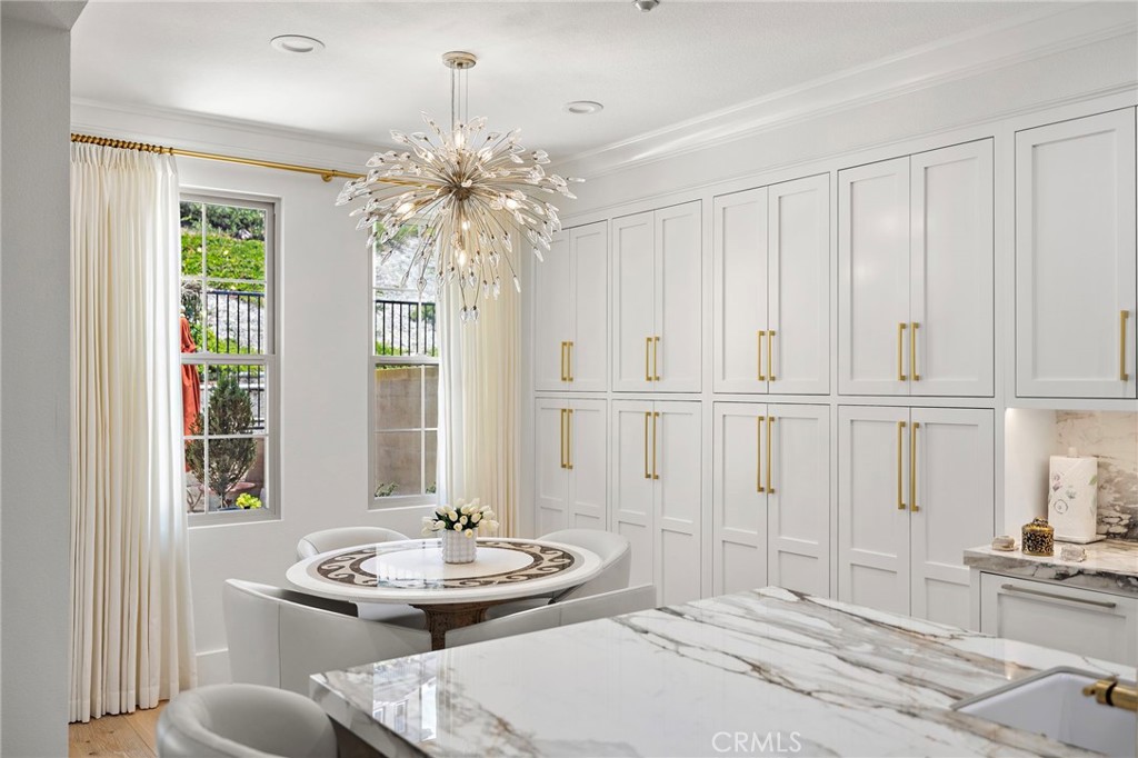 28 Tuscany Ladera Ranch, CA 92694 - Photo 7 of 47 a bedroom with furniture and a chandelier