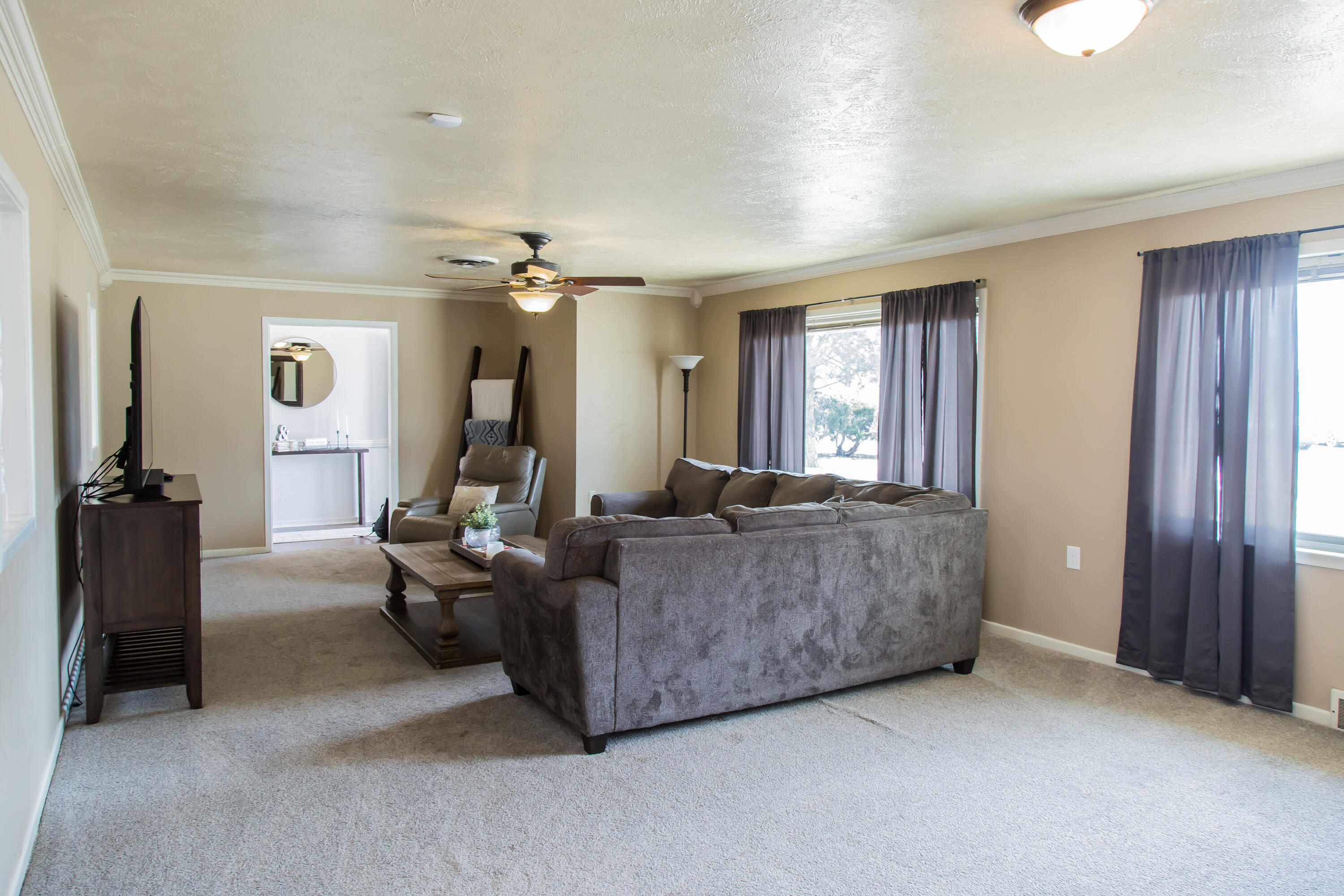 1106 Amarillo Plainview, TX 79072 - Photo 11 of 61 a living room with furniture and a large window