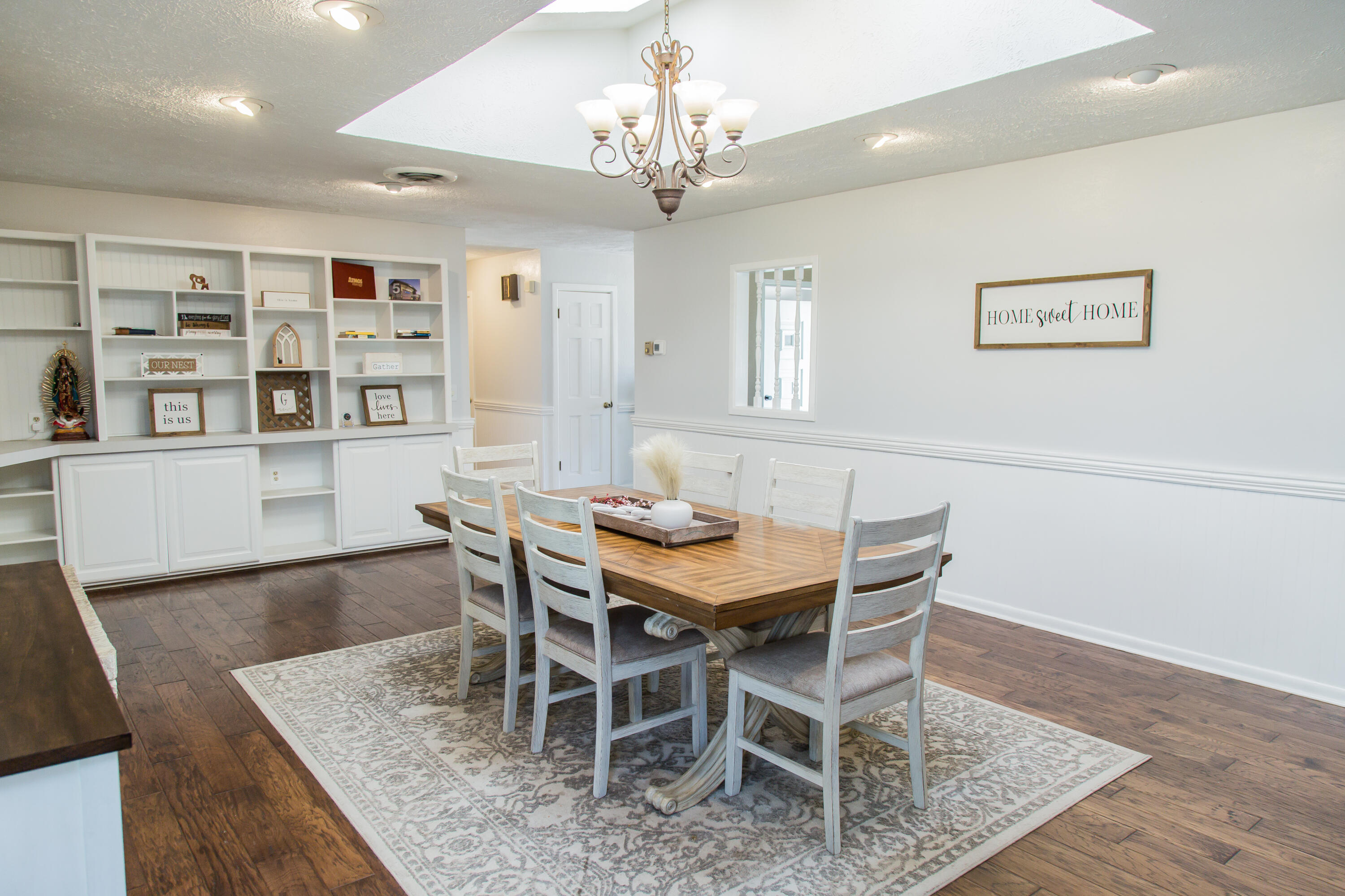 1106 Amarillo Plainview, TX 79072 - Photo 19 of 61 a view of a dining room with furniture and wooden floor