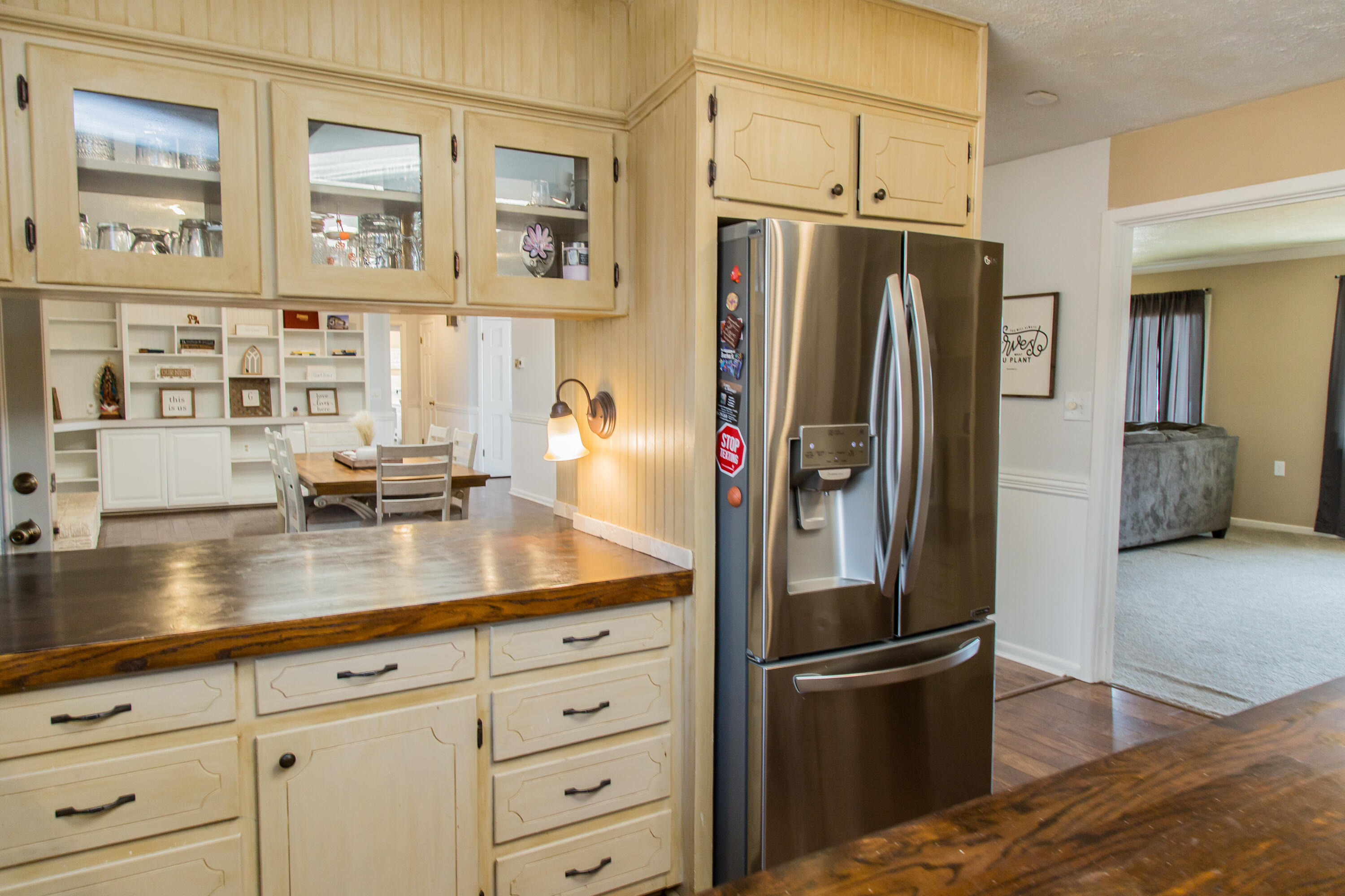 1106 Amarillo Plainview, TX 79072 - Photo 26 of 61 a kitchen with stainless steel appliances a refrigerator and a stove