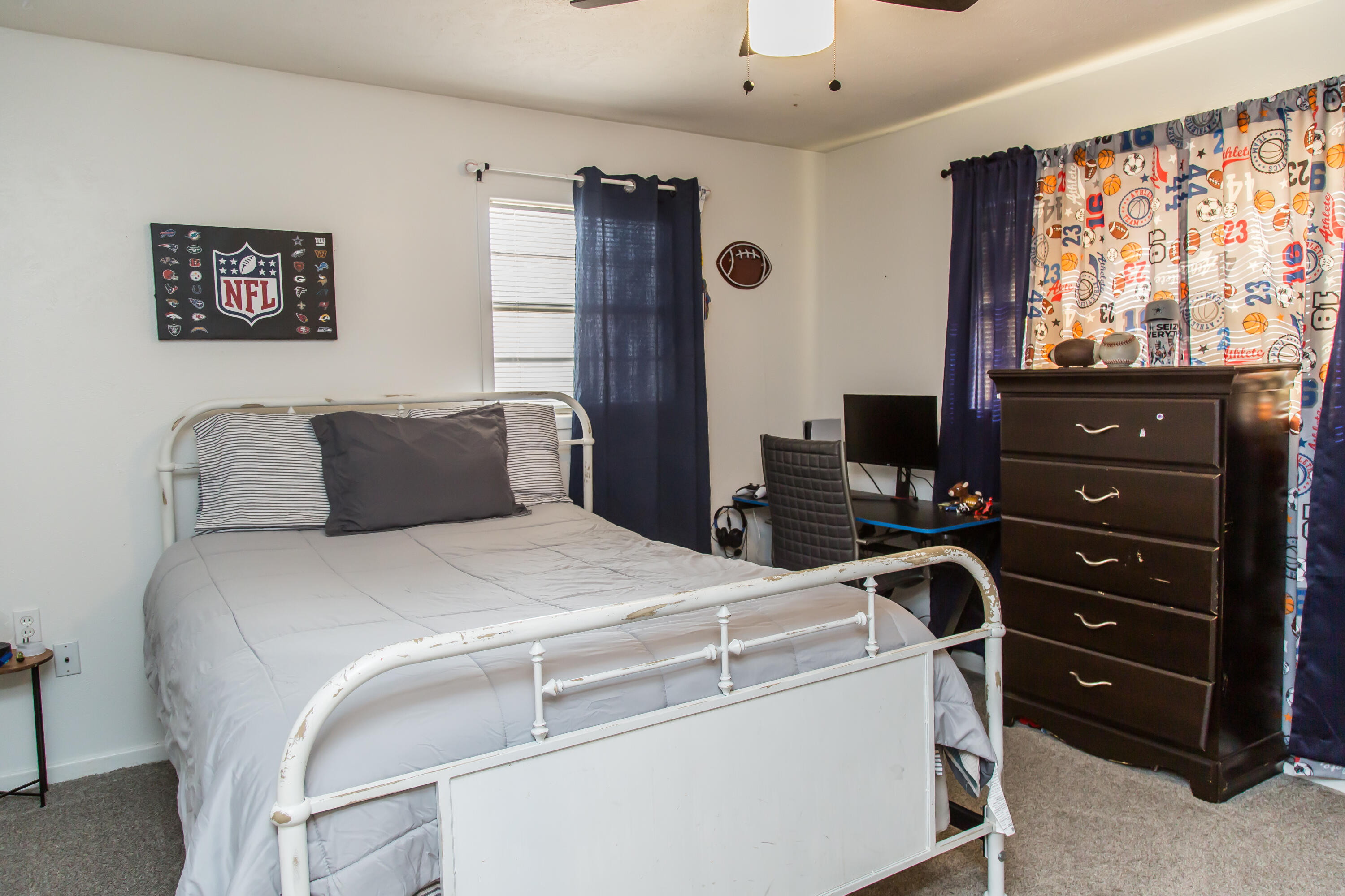 1106 Amarillo Plainview, TX 79072 - Photo 39 of 61 a bedroom with a bed and a flat tv screen