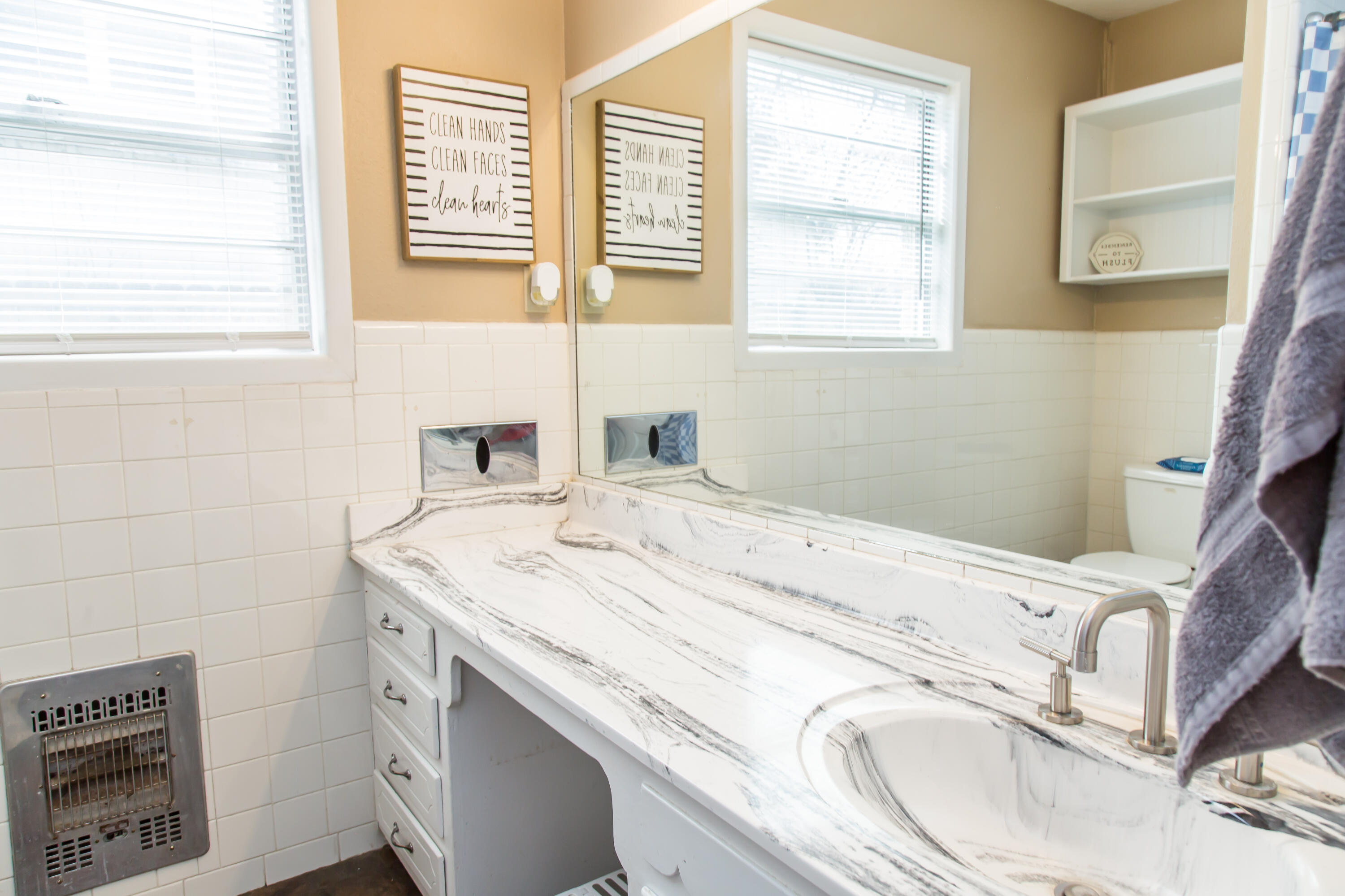 1106 Amarillo Plainview, TX 79072 - Photo 43 of 61 a bathroom with a sink and a washing machine