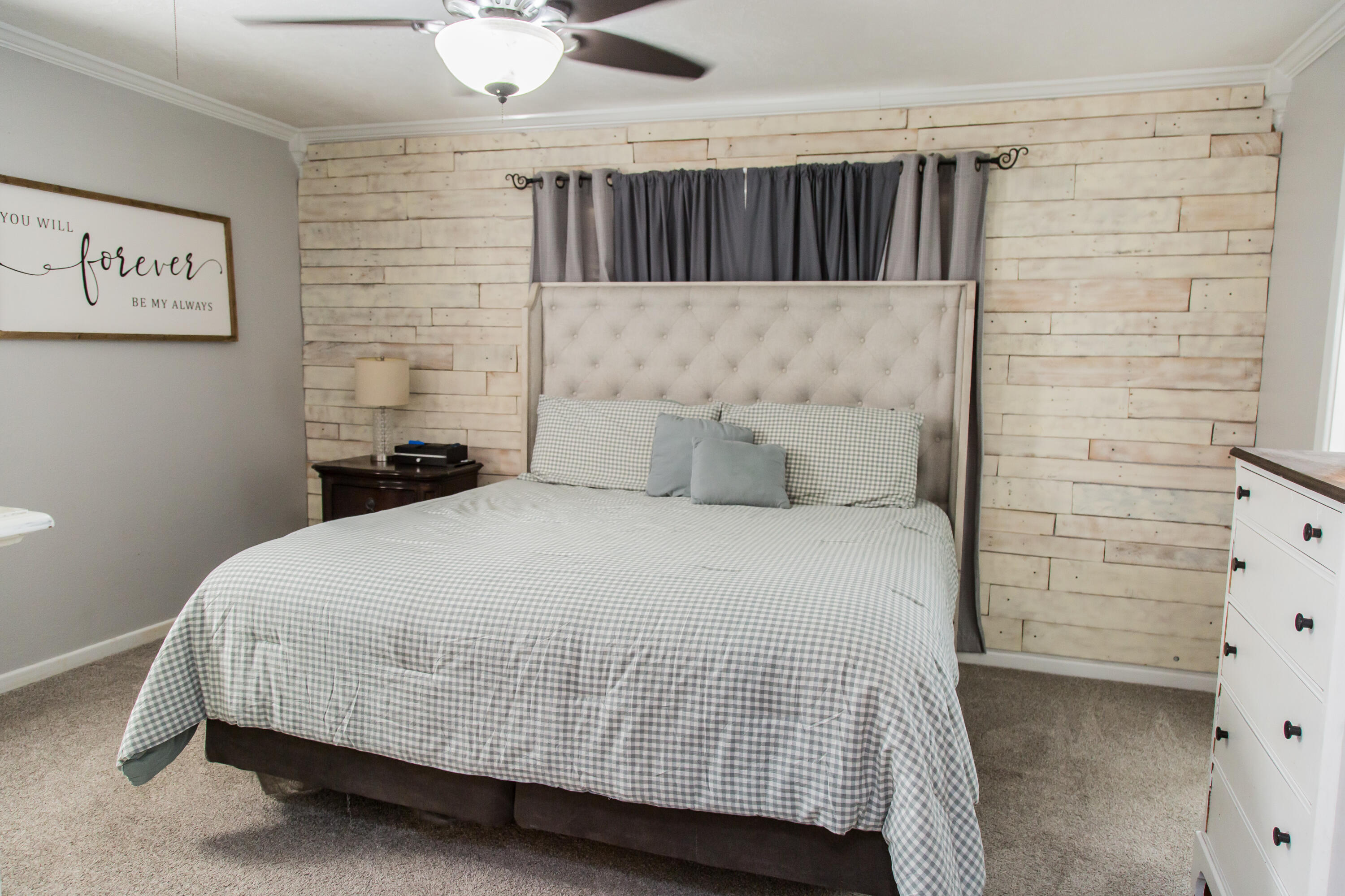 1106 Amarillo Plainview, TX 79072 - Photo 47 of 61 a bedroom with a bed and wall painting