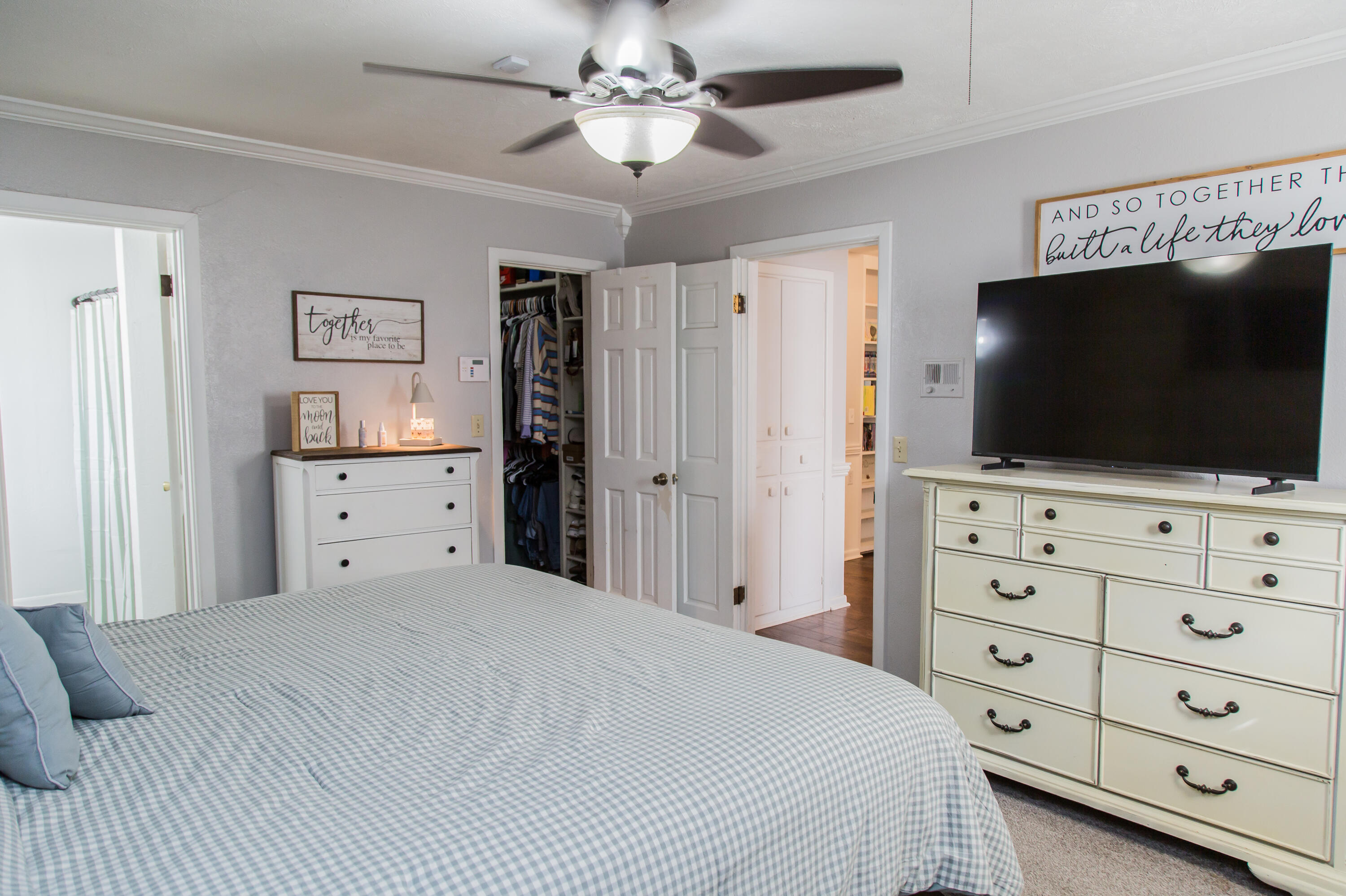 1106 Amarillo Plainview, TX 79072 - Photo 49 of 61 a bedroom with a large bed and a flat screen tv
