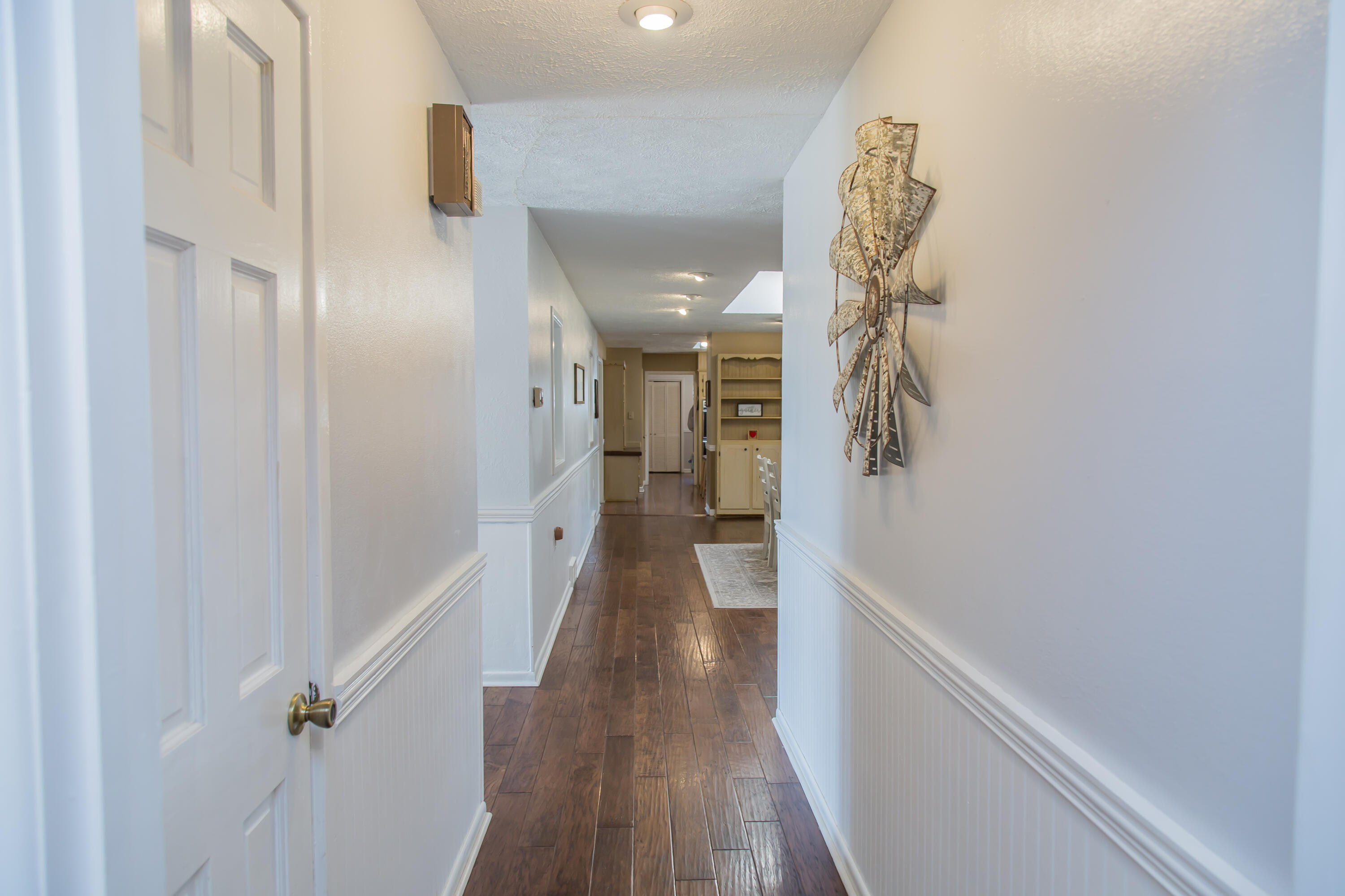 1106 Amarillo Plainview, TX 79072 - Photo 53 of 61 a view of hallway with wooden floor