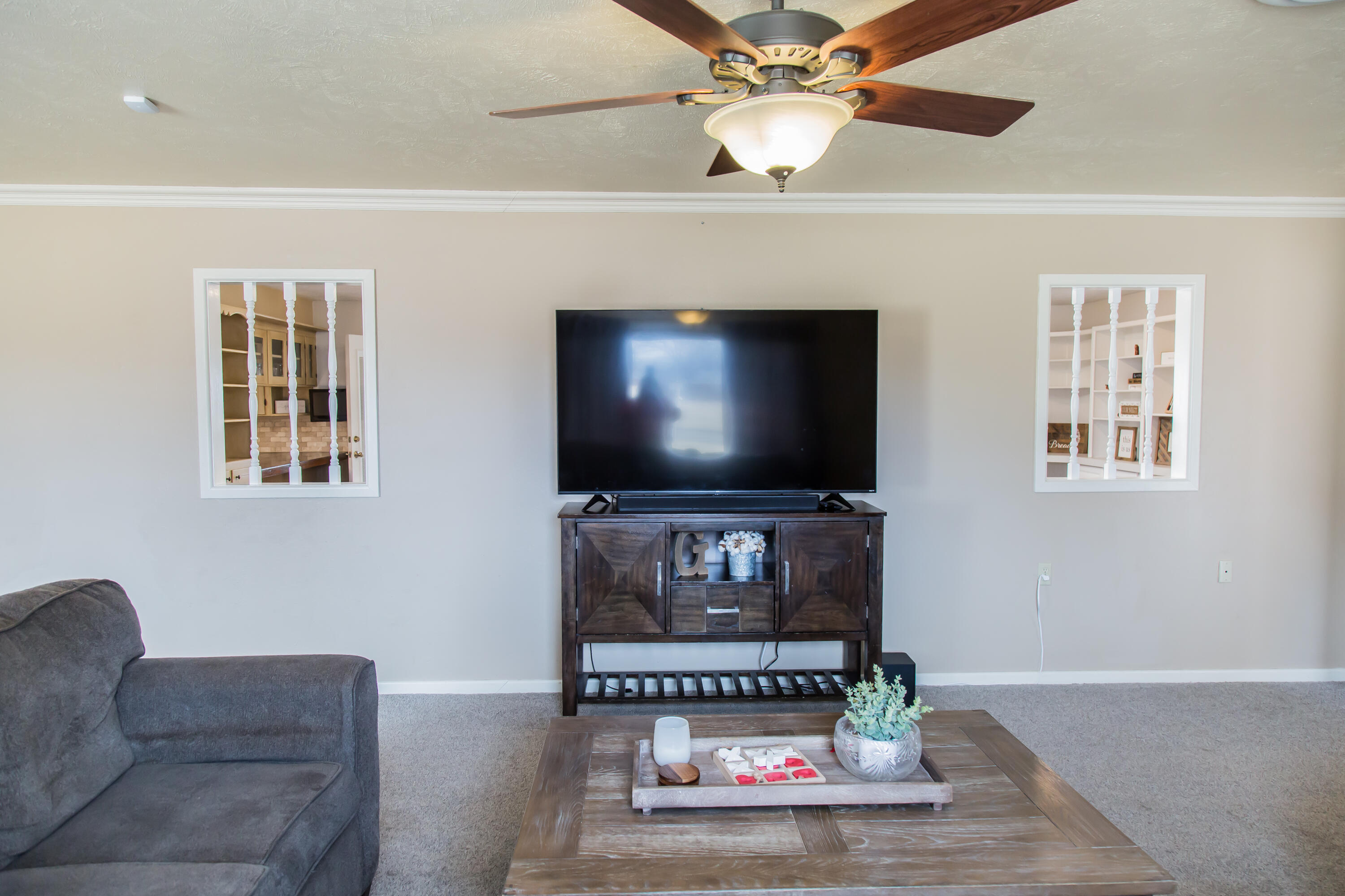 1106 Amarillo Plainview, TX 79072 - Photo 9 of 61 a living room with furniture and a flat screen tv