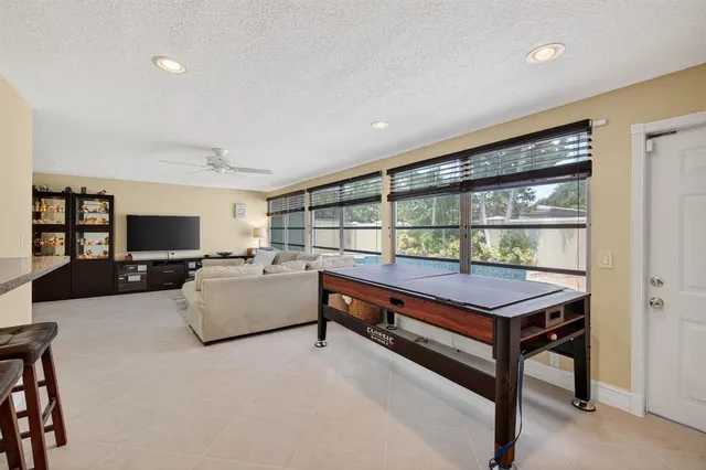 a view of a walk in closet and wooden floor