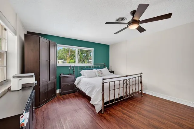 a workspace with furniture and a window