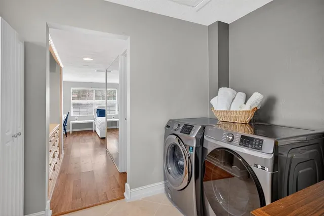 an aerial view of multiple house with outdoor space